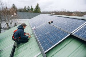 Technician checking roof requirements for solar panels